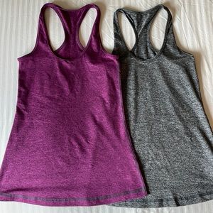 Set of two tanks from Four Athletics Size Medium